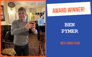 The winner of the October introductory question at the Bury St Edmunds networking event, holding the trophy.