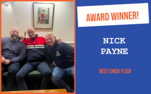 The winner of the introductory question at the October meeting of the South East Essex PubNetworking event, sitting with the event's host and ambassador and holding the trophy.